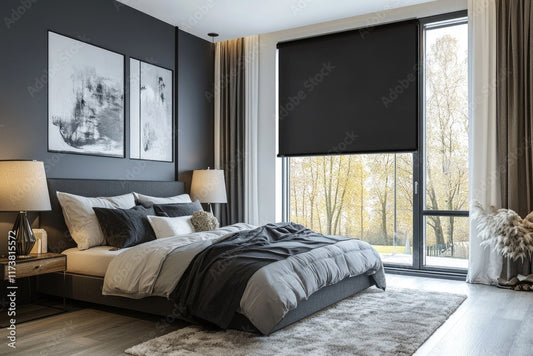 Modern bedroom with blackout privacy blinds partially lowered over large floor-to-ceiling windows, enhancing comfort and light control.